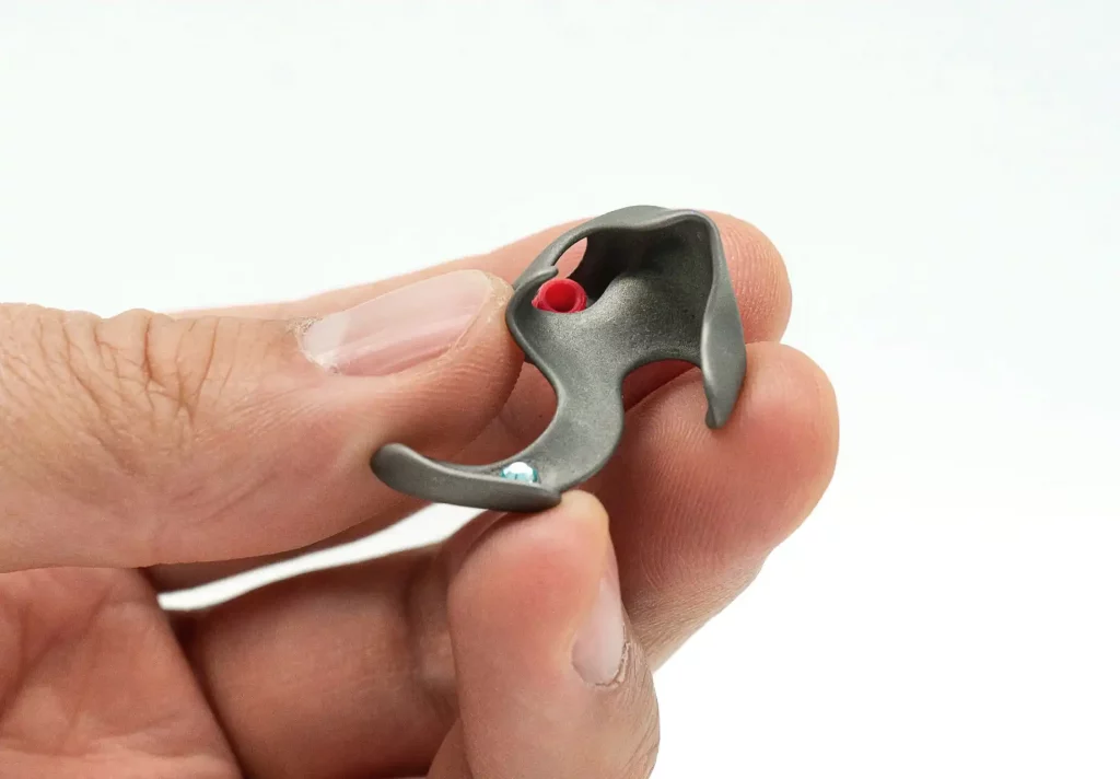 3D printed titanium hearing aid earmold by2onelab.